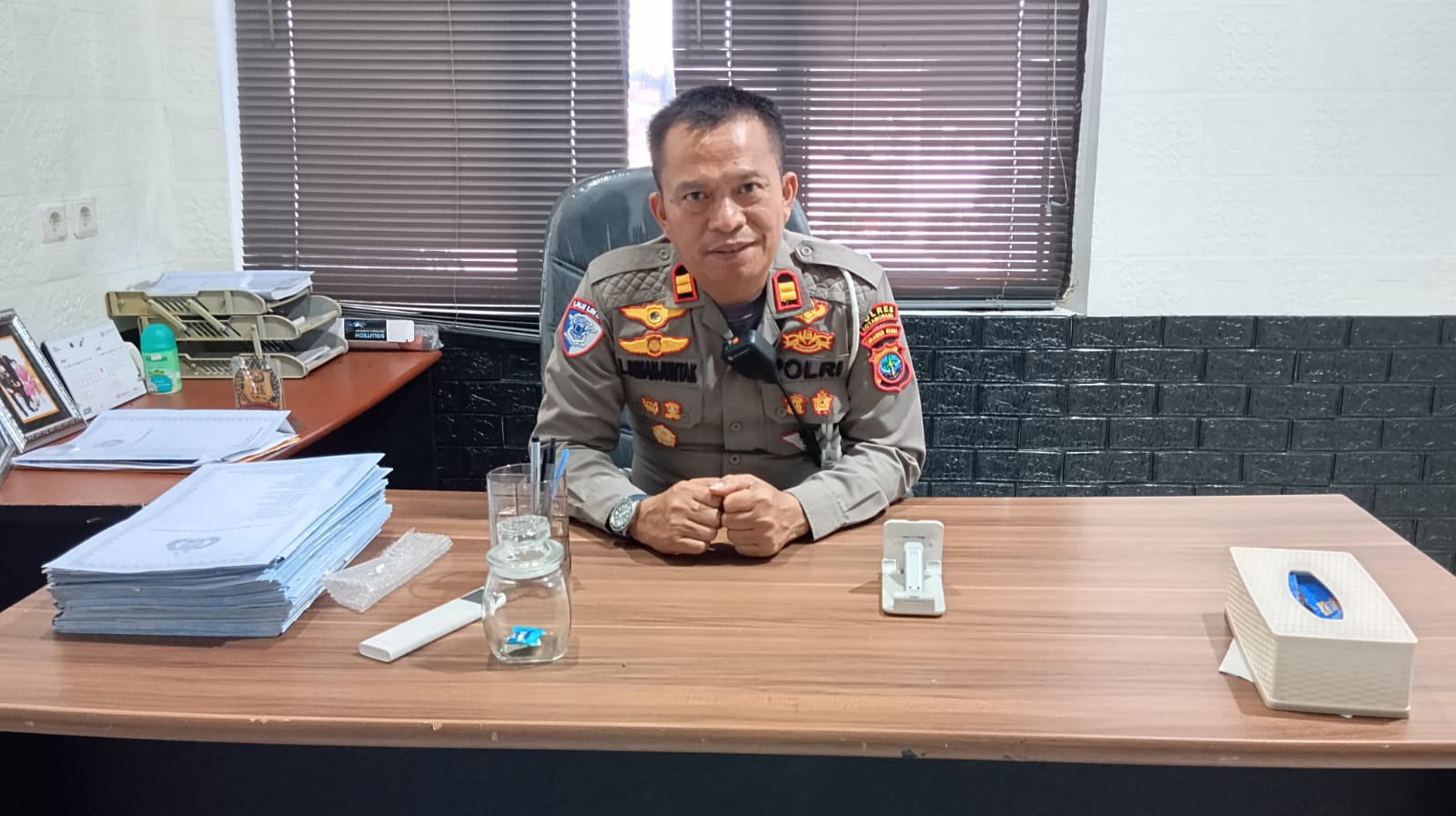 Kasat Lantas Polres Kotamobagu Iptu Luster Simanjuntak SH (foto:Zakir)
